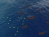 Aeon planes fly over Cybran ships